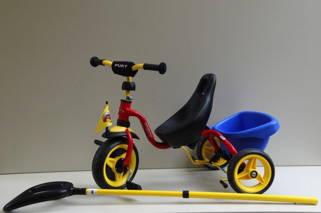 Driewieler met duwstang